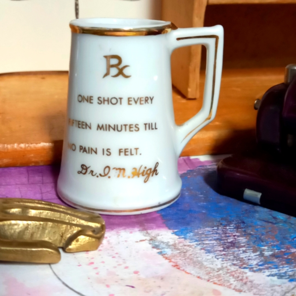 Vintage advertising porcelain shot glass